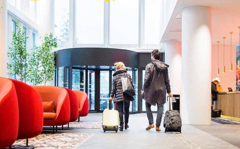 Number of asylum seekers living in UK hotels halves in one year
